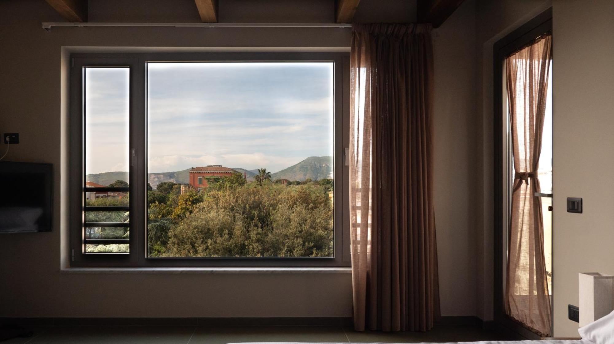 Penthouse Rooms Marigliano - Eleganza Sopra Le Nuvole Esterno foto
