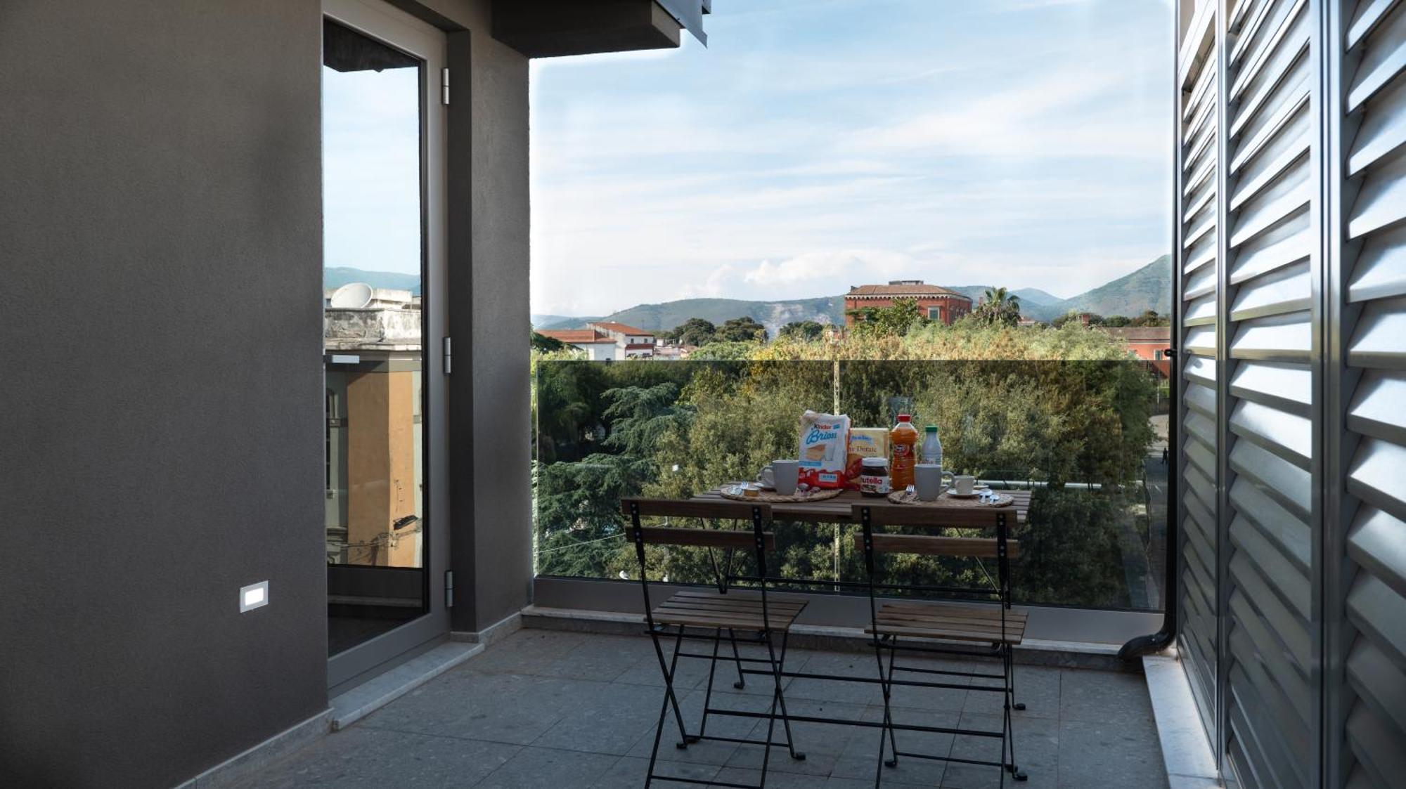 Penthouse Rooms Marigliano - Eleganza Sopra Le Nuvole Esterno foto